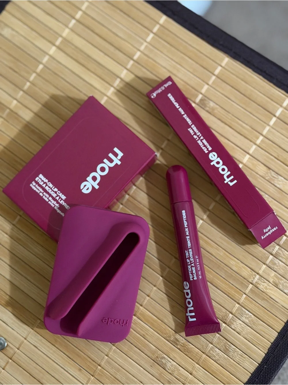 Rhode lip tint and snap-on lip case set in raspberry jelly